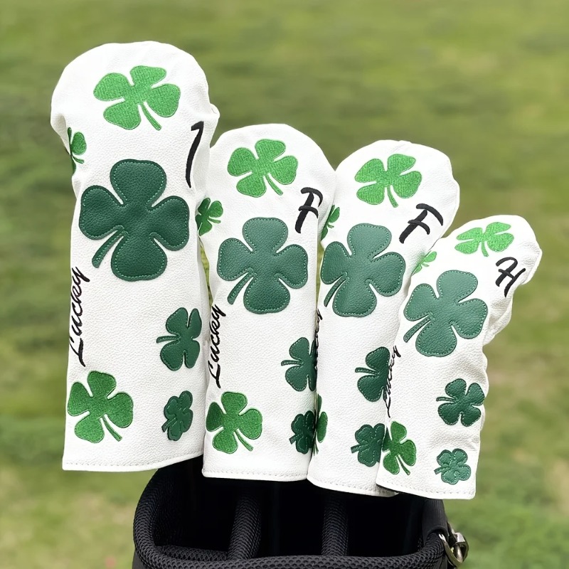 Golf Equipment Nearby - スタイリッシュなクローバーゴルフクラブヘッドカバー - 耐久性のある白地に緑の四つ葉のクローバーデザイン、保護用クラブプロテクター